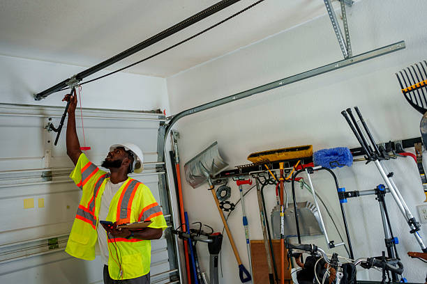 Professional Garage Door Panel Replacement technician working in Gearhart, OR